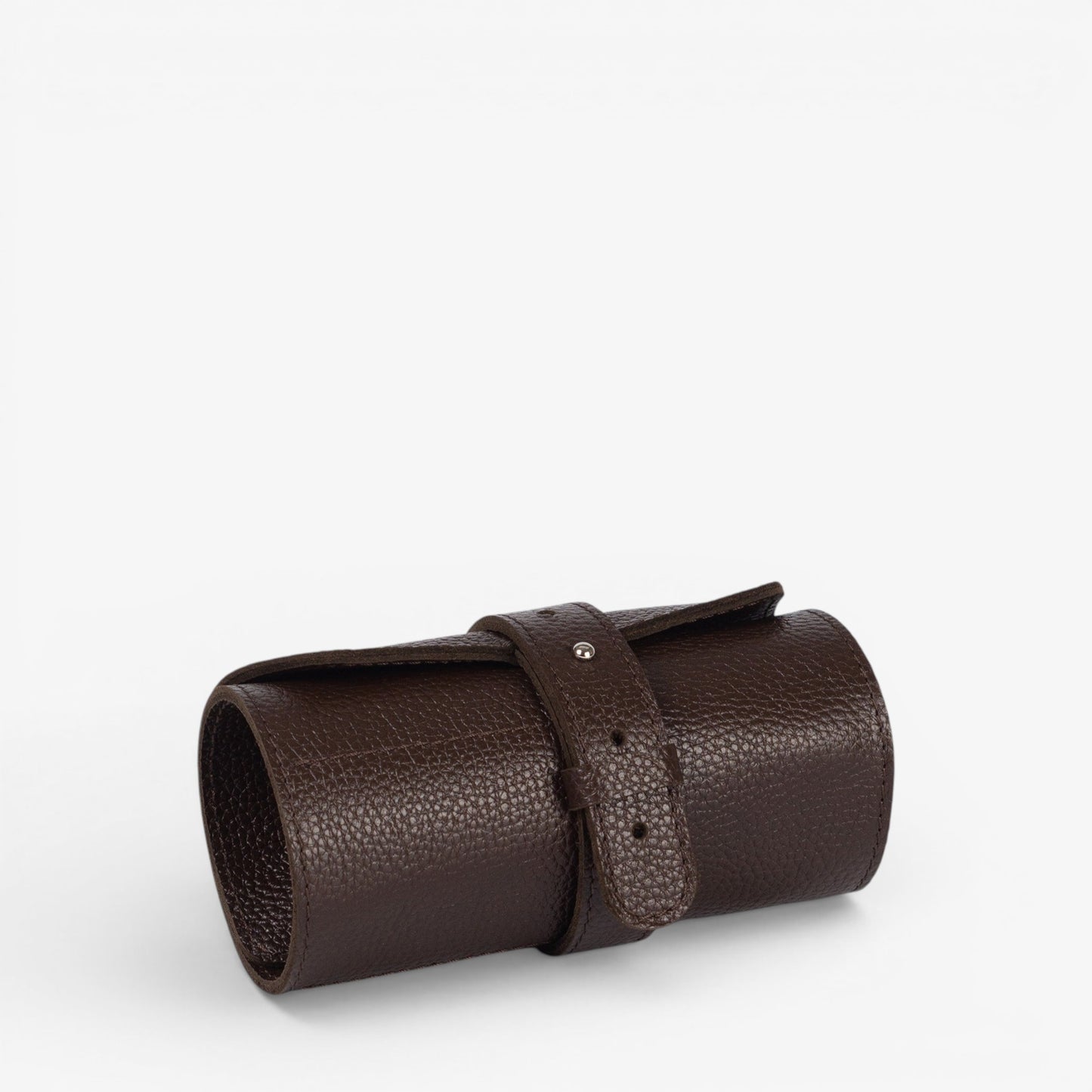 Chocolate brown Aven watch roll closed with strap and pebbled texture