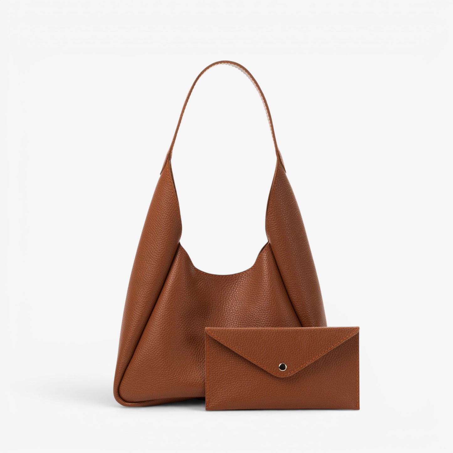 Brown leather handbag with matching wallet on a white background