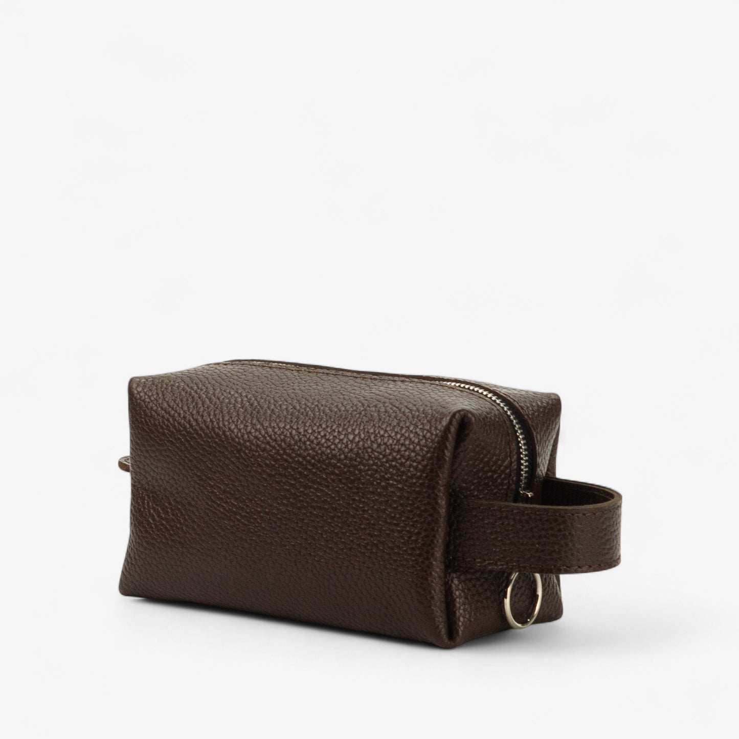 Brown leather toiletry bag on a white background