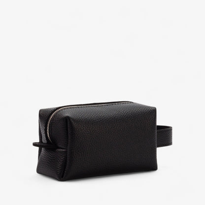 Black leather toiletry bag on a white background