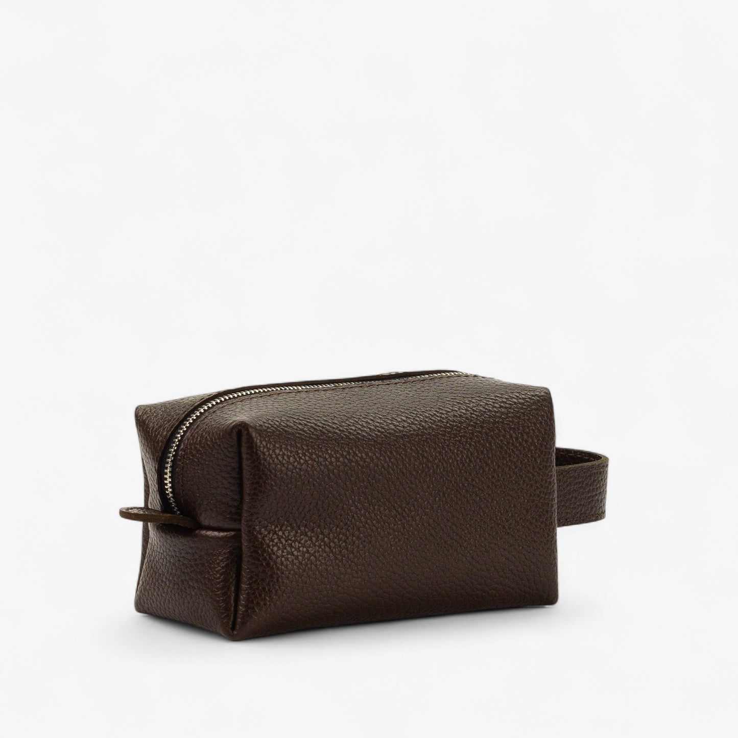 Brown leather toiletry bag on a white background