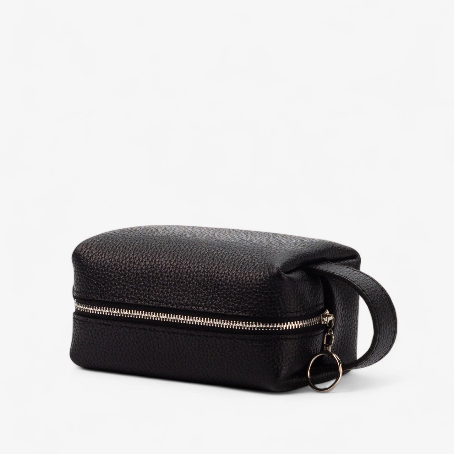 Black leather toiletry bag with a zipper on a white background