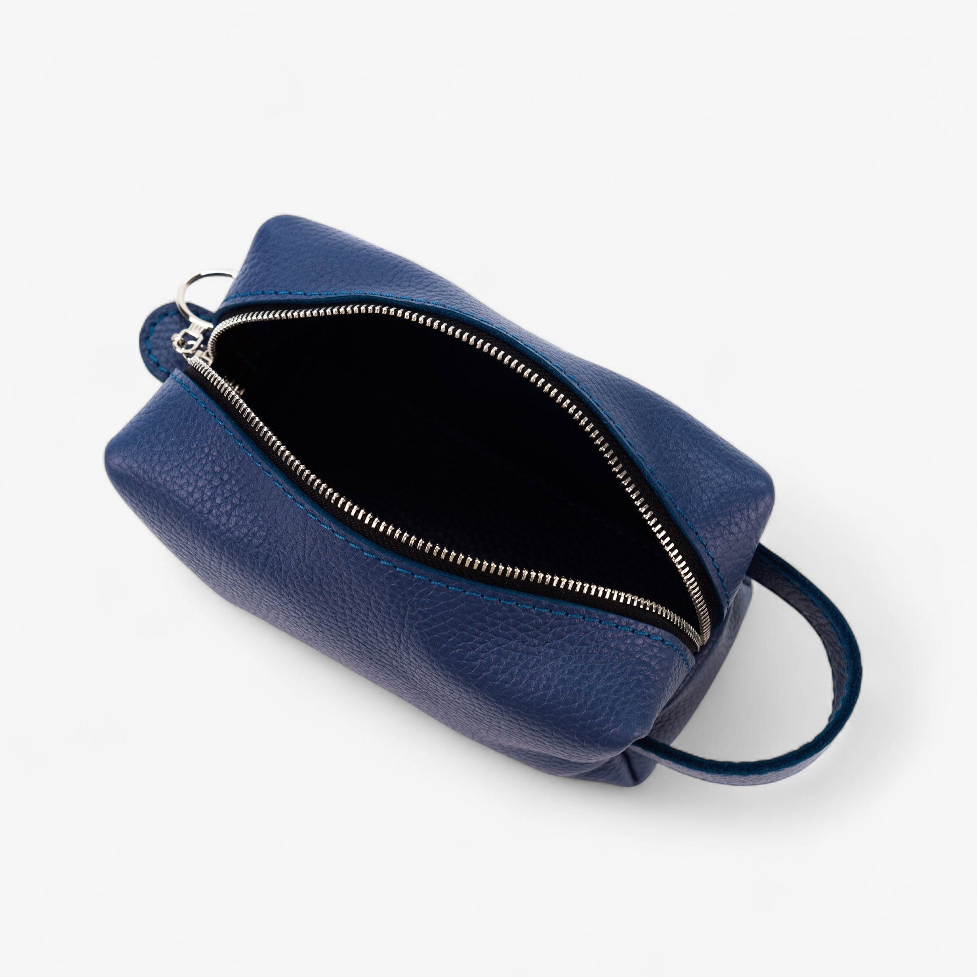 Blue leather pouch with zipper on a white background