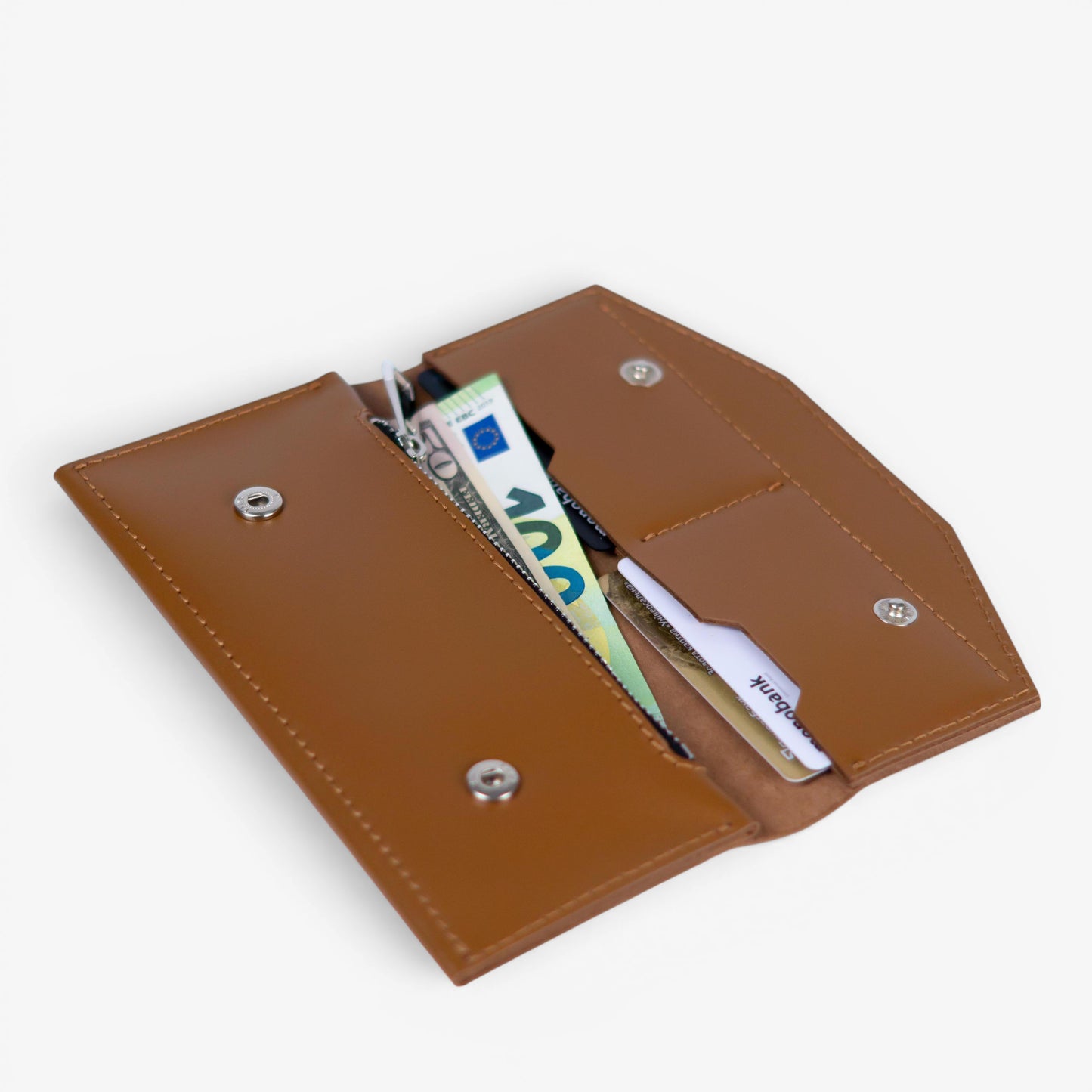 Open brown leather wallet filled with cards and cash, compact everyday design