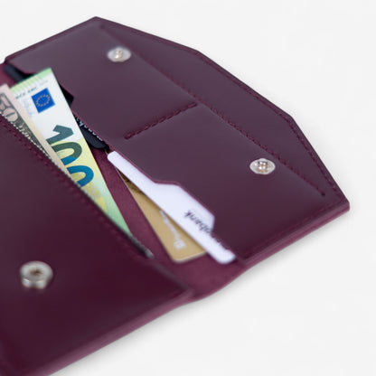 Burgundy leather wallet with button closure, minimalist handmade design
