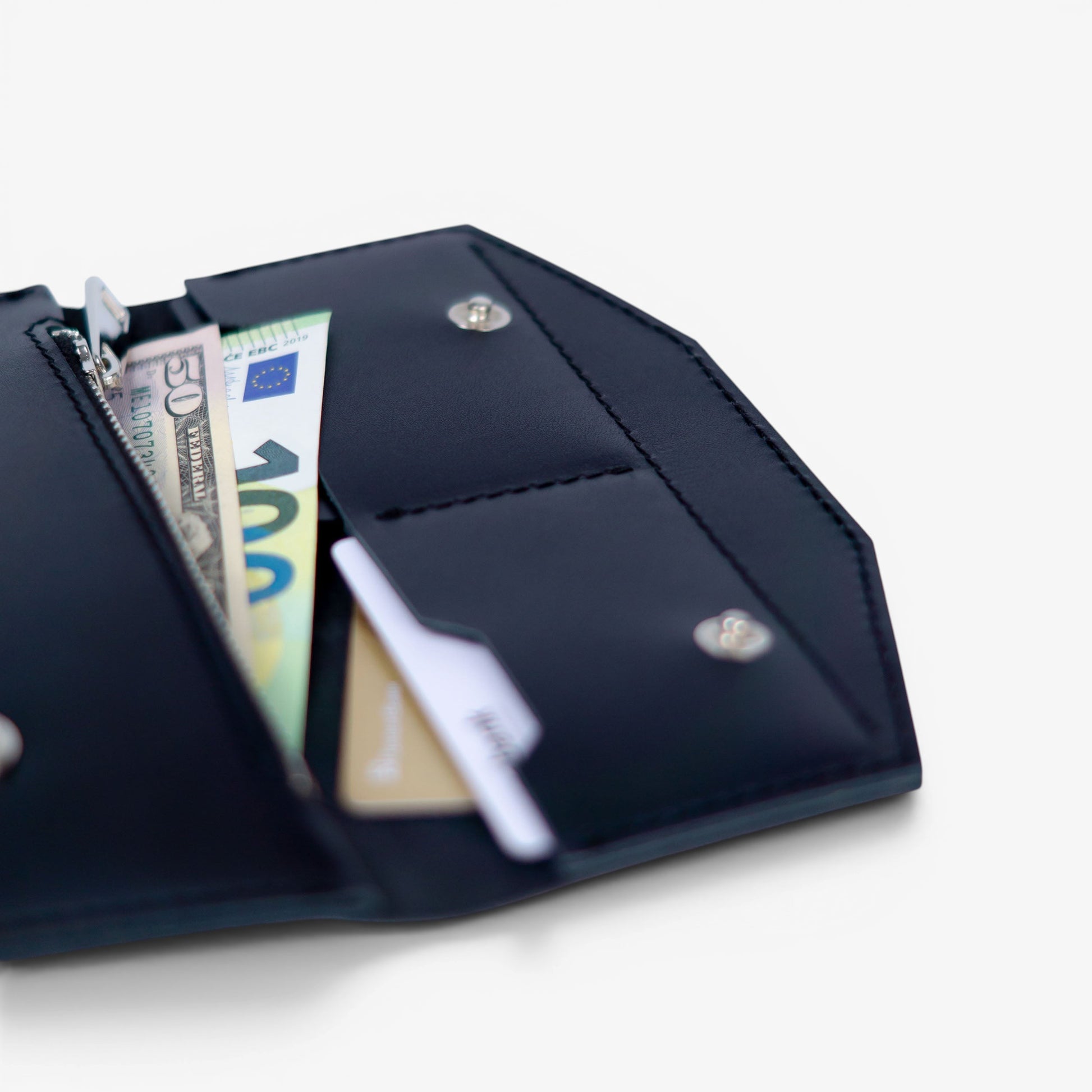 Black leather wallet with button closure, minimalist handmade design