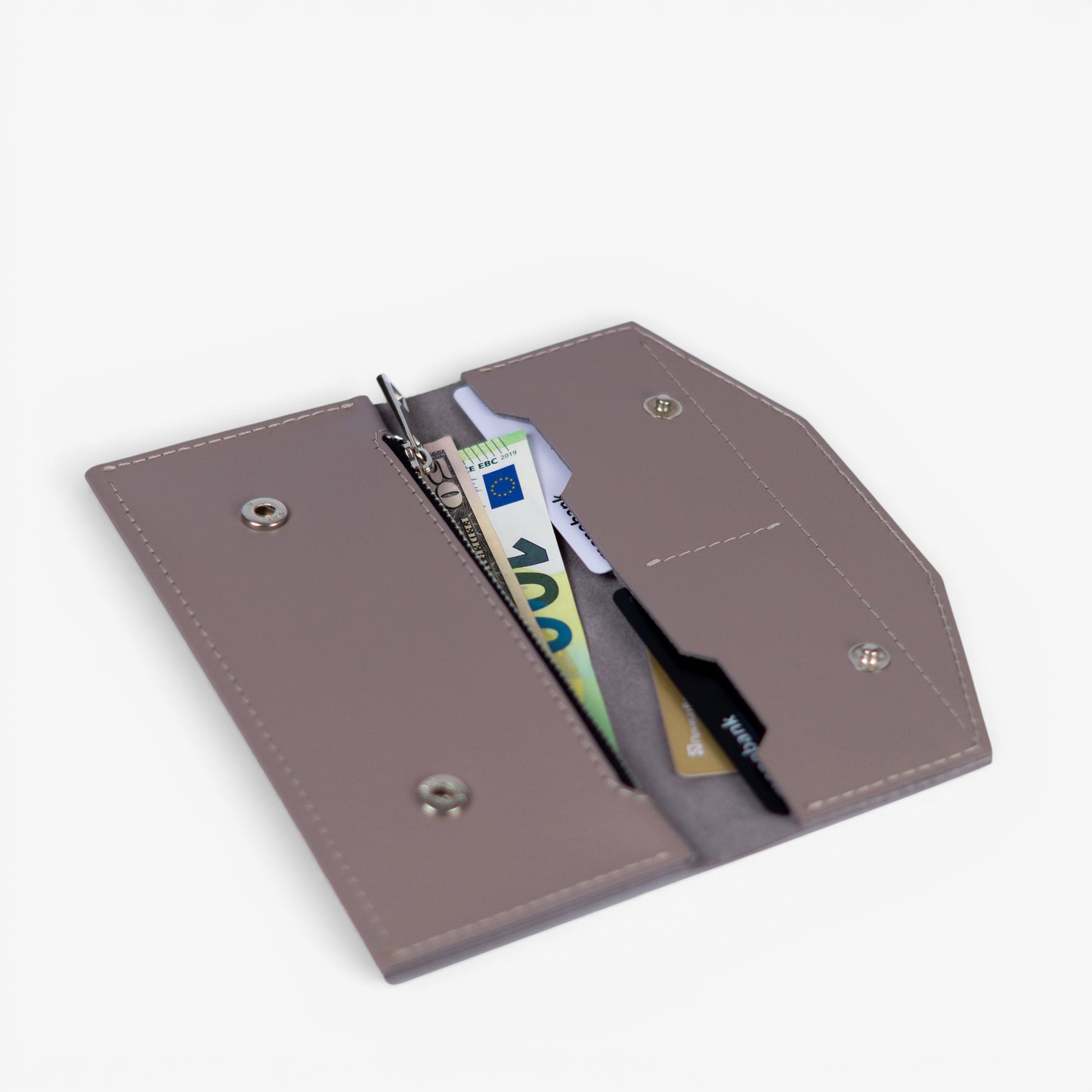 Open gray leather wallet filled with cards and cash, compact everyday design