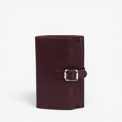 Burgundy Elin jewelry roll open with necklace holders and zipper pocket