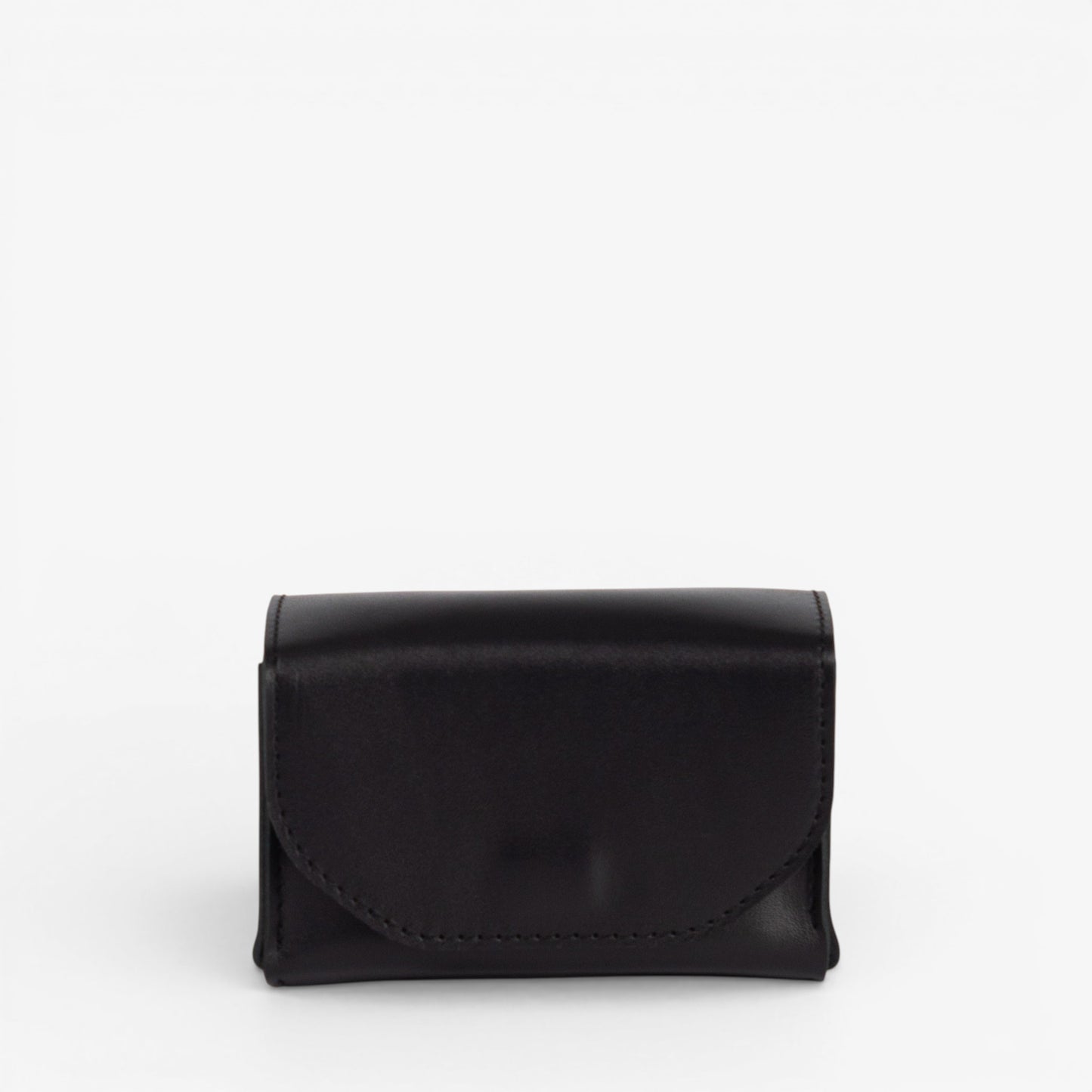 Black Arcana tarot deck case closed with structured leather shape and hidden magnetic closure