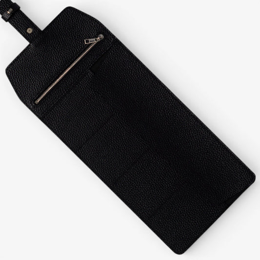Black Aven watch roll open with watch sections and zipper pocket