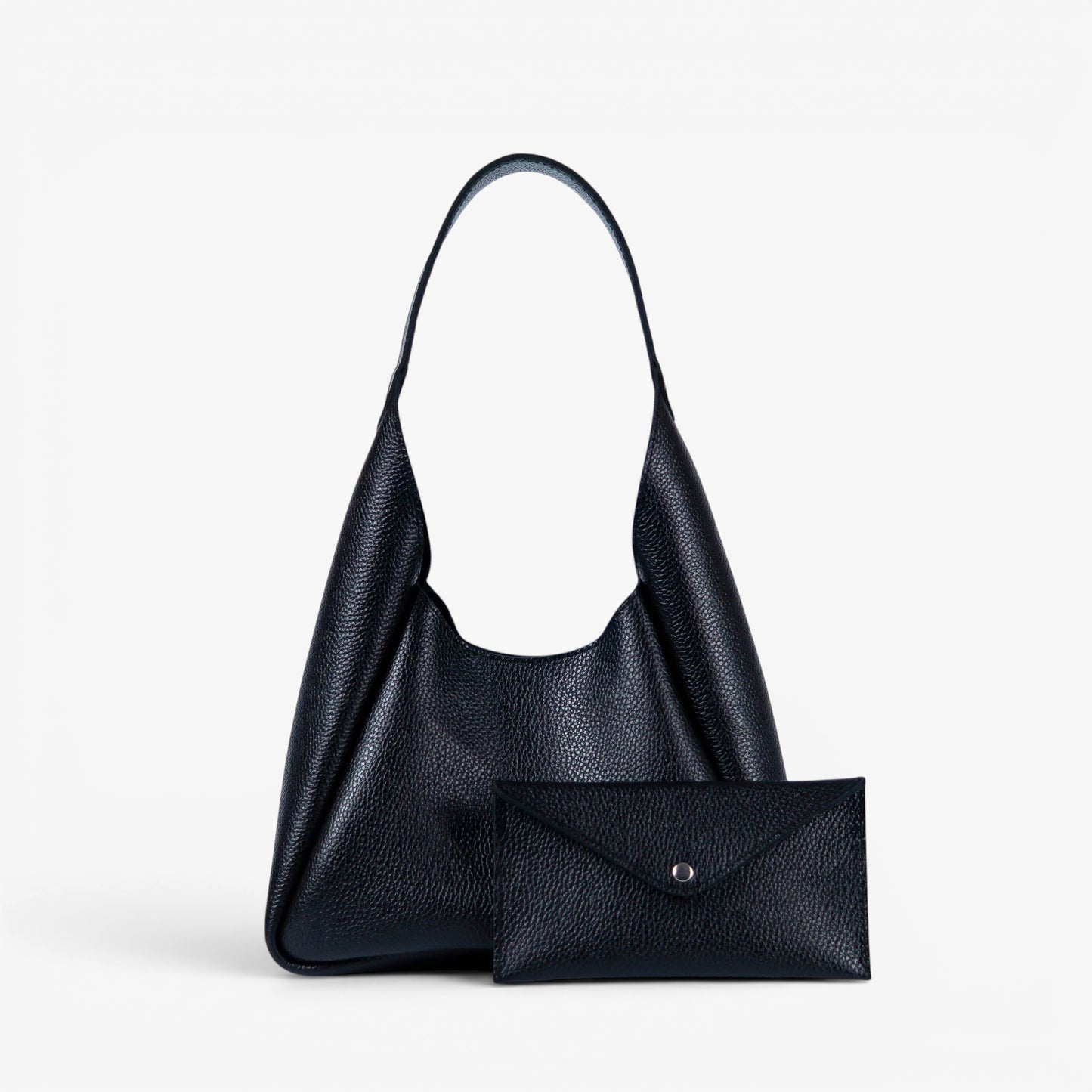 Pache Torba hobo bag in black pebbled leather with a matching envelope wallet. Magnetic closure.